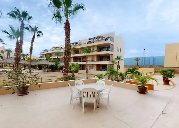 Inviting Across From The With Pool, Grill, Balcony & Golf Nearby